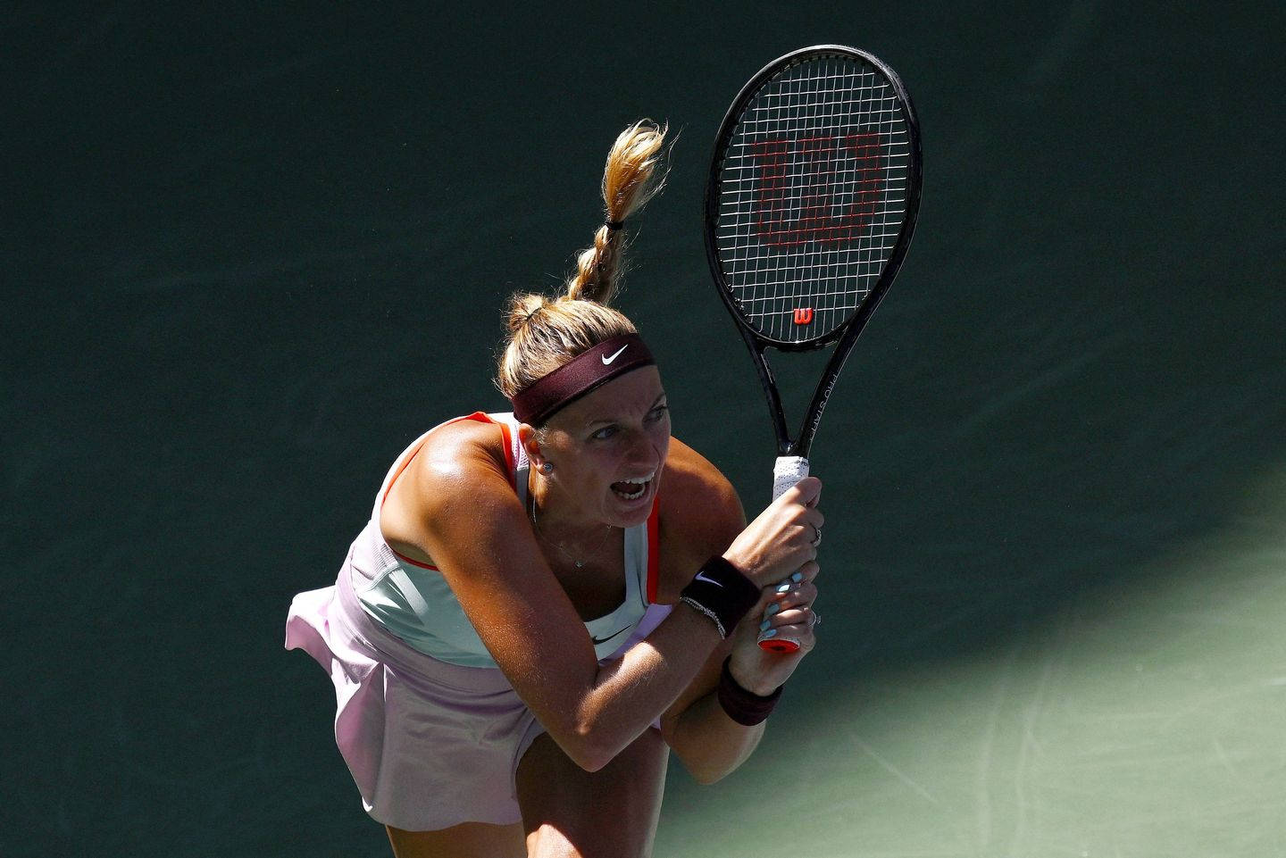 Petra Kvitova In Action - Dominating The Tennis Court Wallpaper