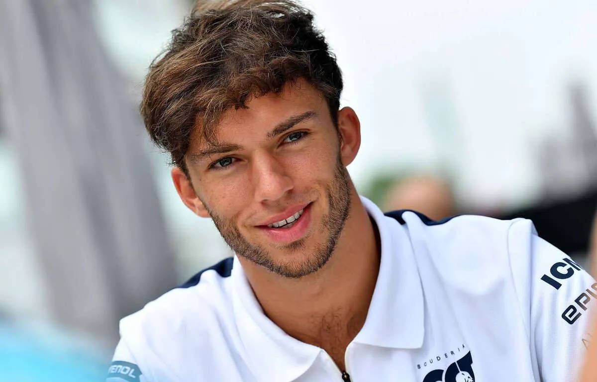 Pierre Gasly - F1 Ace In A Cool White Polo Shirt Wallpaper