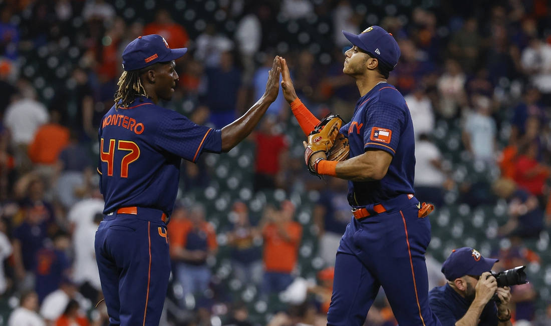 Rafael Montero And His Teammate Wallpaper