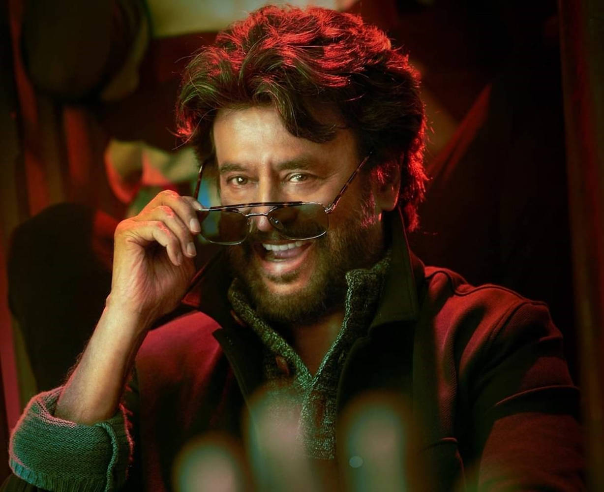 Rajinikanth Removing Sunglasses Wallpaper