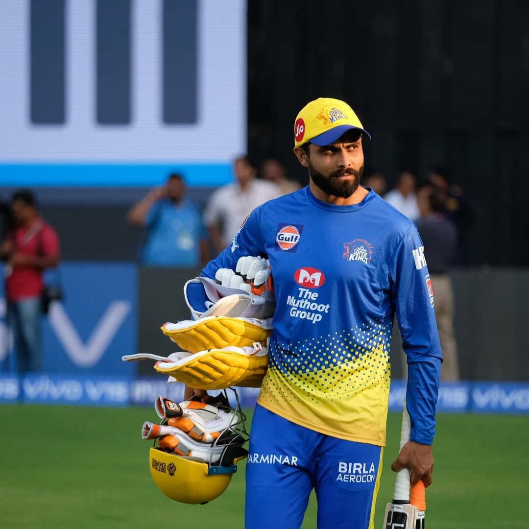 Ravindra Jadeja Carrying Game Equipment Wallpaper