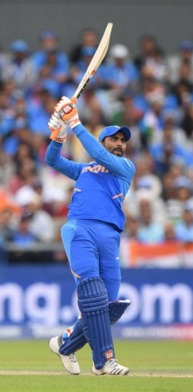 Ravindra Jadeja Holding Up A Bat Wallpaper