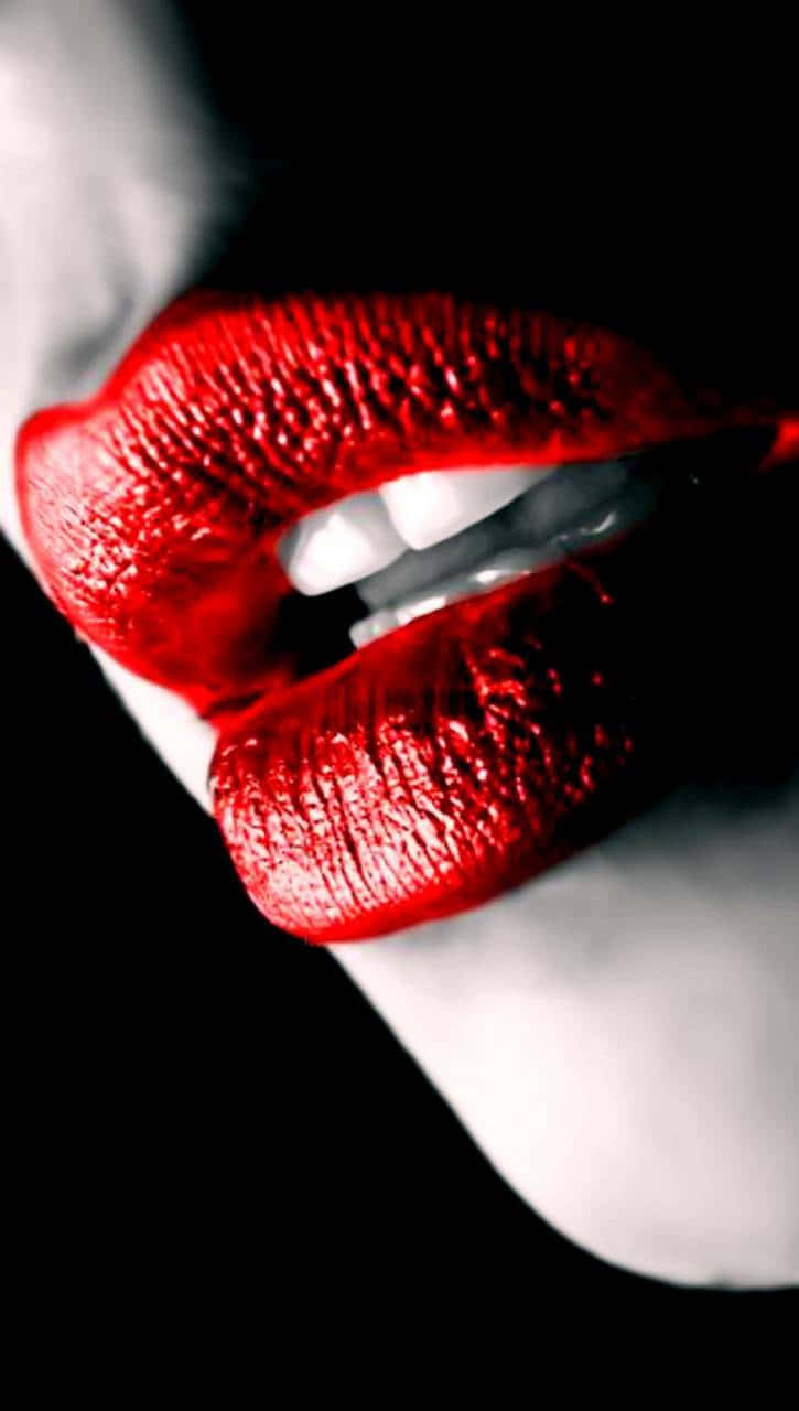 Ravishing Red Lips On Cherry Background Wallpaper