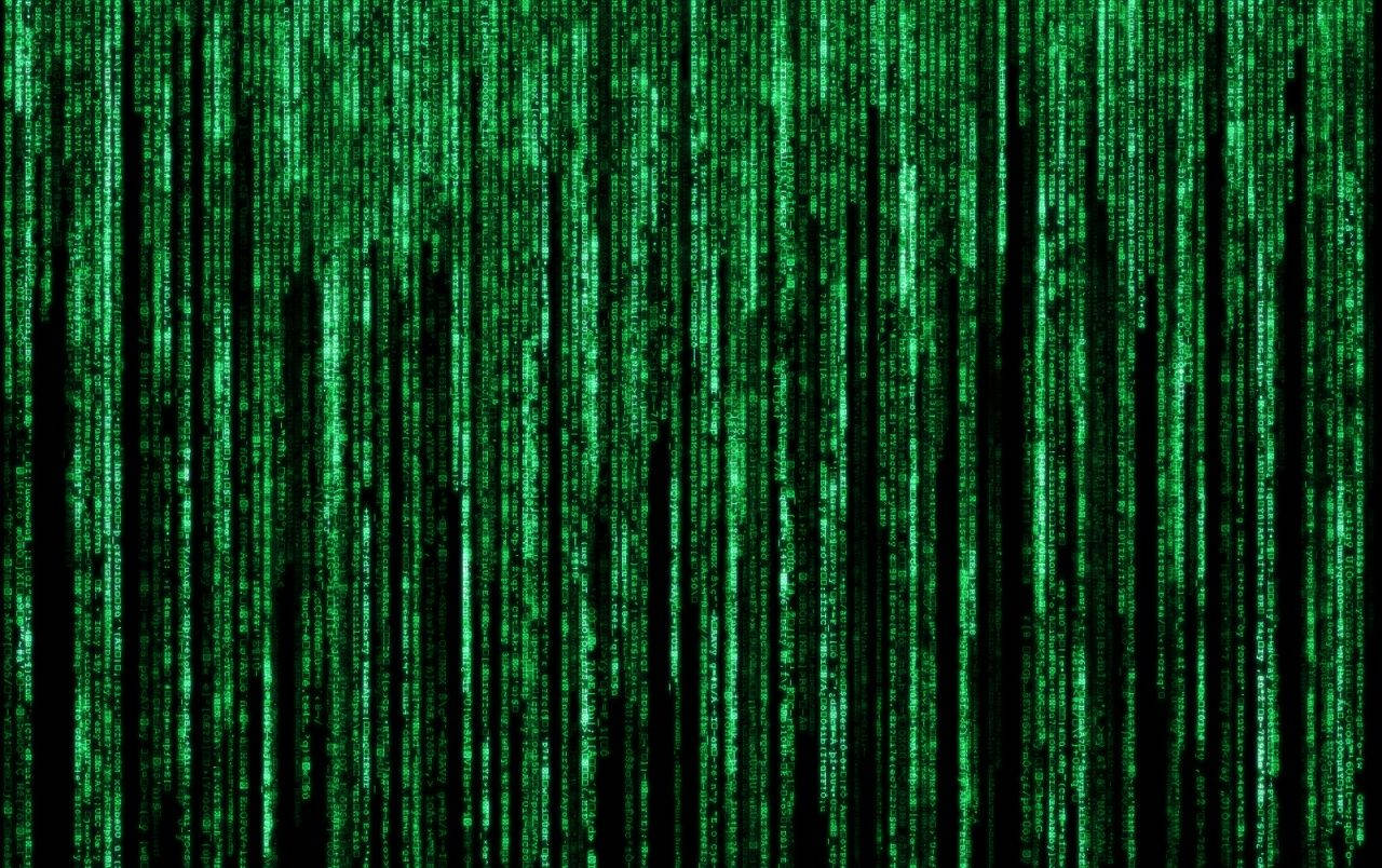 Retrace The Steps Of Neo Through The Crowded Neon Streets Of The Matrix Wallpaper