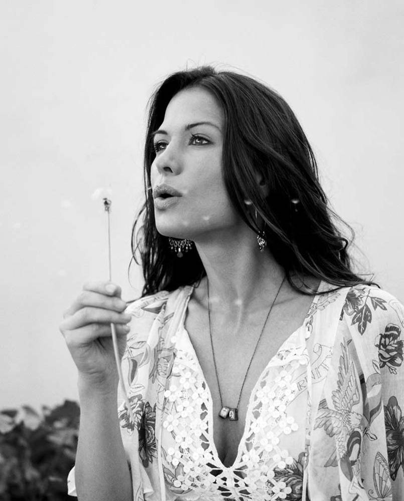 Rhona Mitra Blowing Dandelions Wallpaper