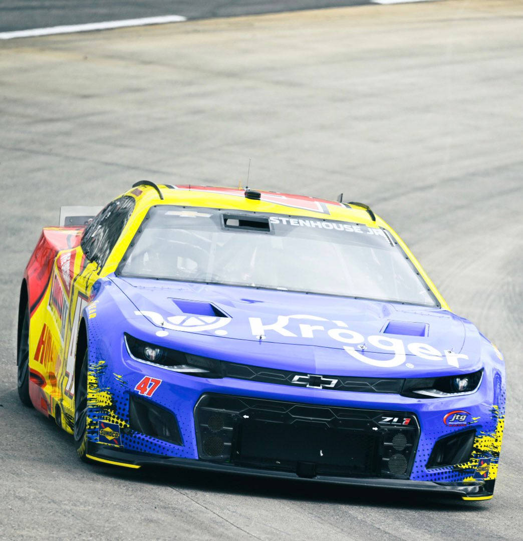 Ricky Stenhouse Jr. In His Vibrant Race Car, Close-up View Wallpaper