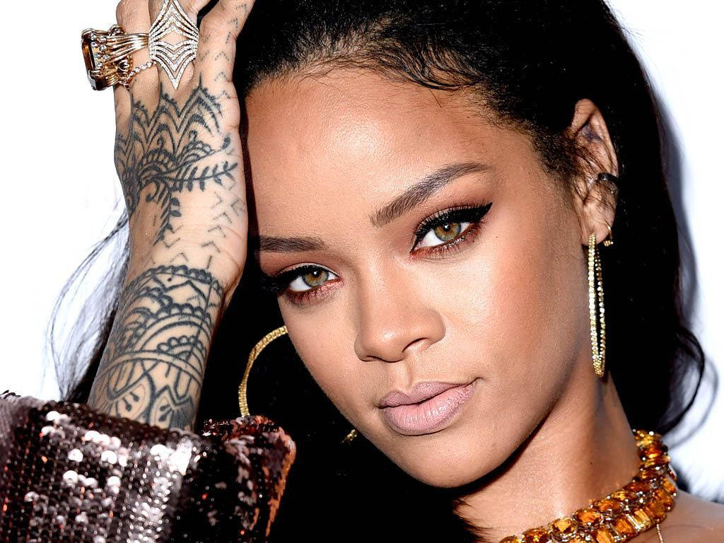 Rihanna Shines With Her Unique Tattoo Wallpaper