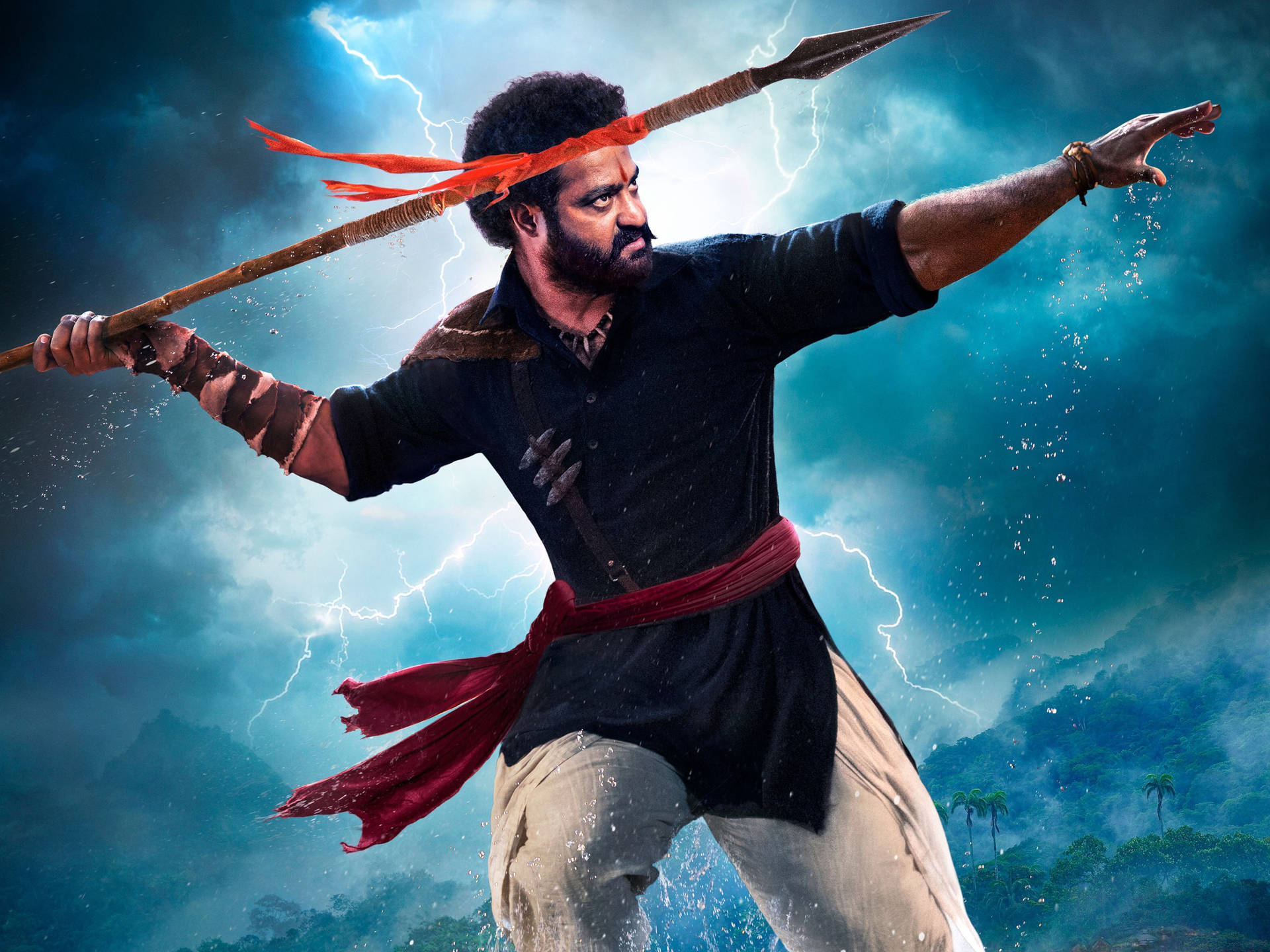 Rrr Komaram Throwing A Spear Wallpaper