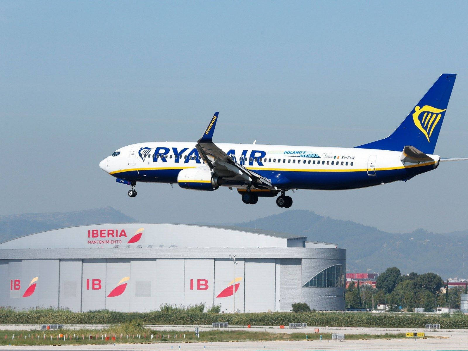 Ryanair Airplane Over Building Wallpaper