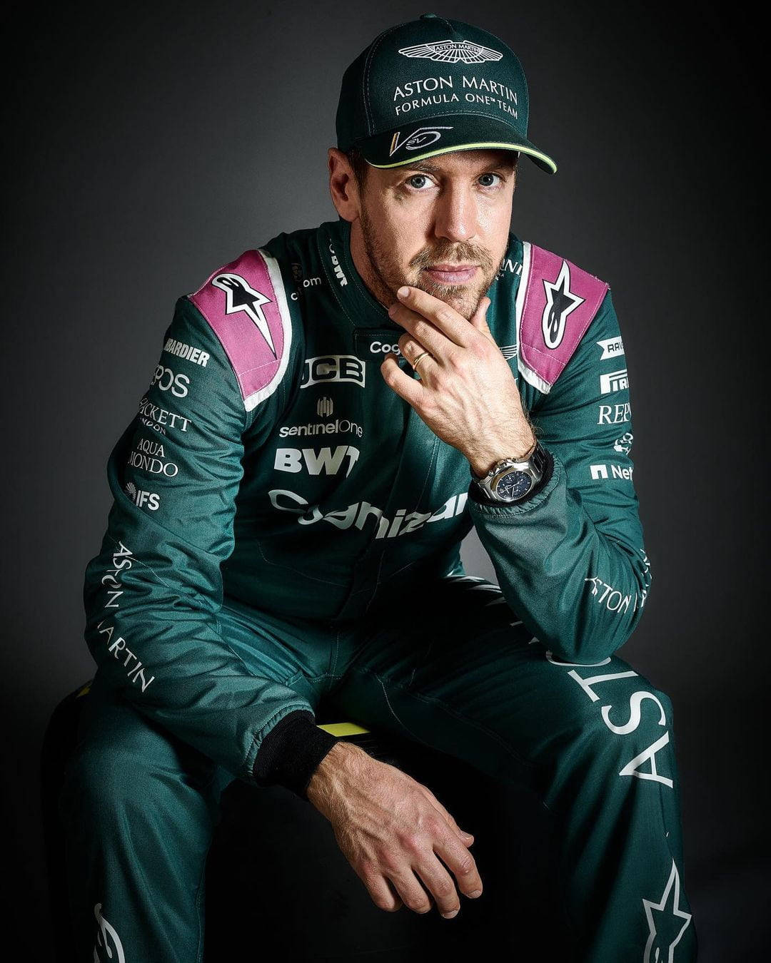 Sebastian Vettel Hand On Chin Wallpaper