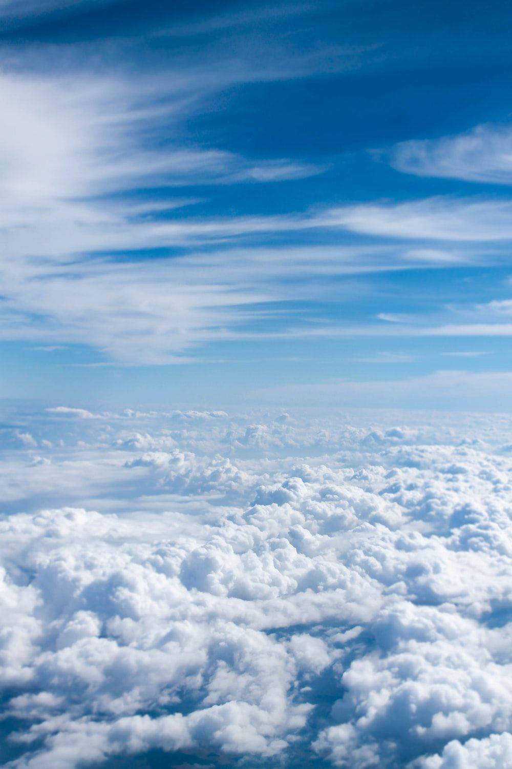 Serene Blue Sky Over Pacific Ocean Wallpaper