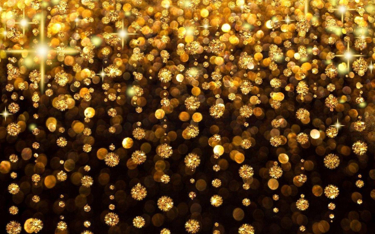 Shimmering Black And Gold Background Wallpaper