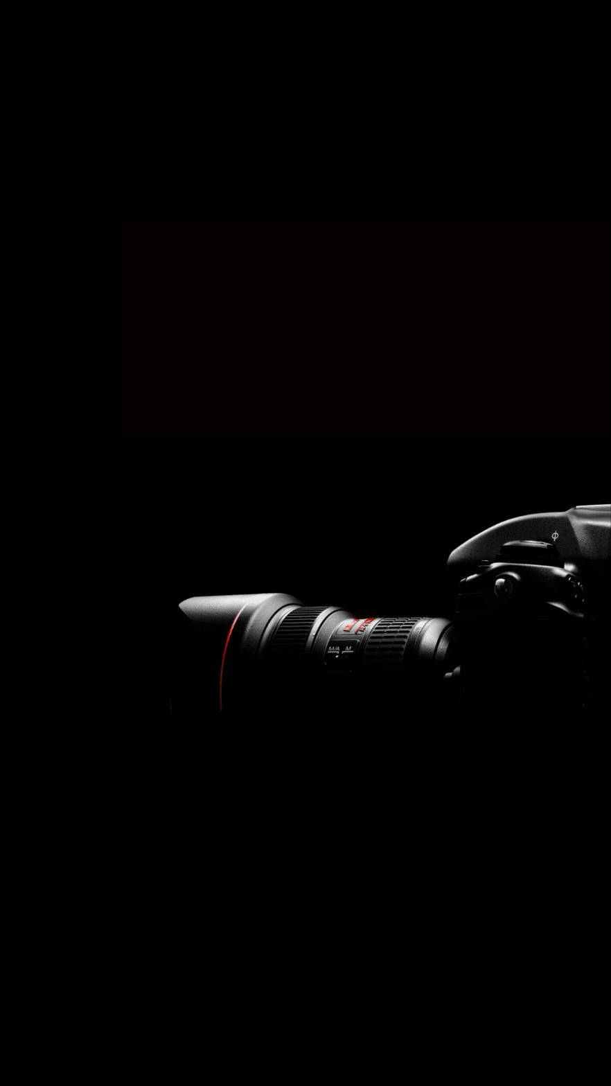 Shiny Black Dslr Camera Wallpaper