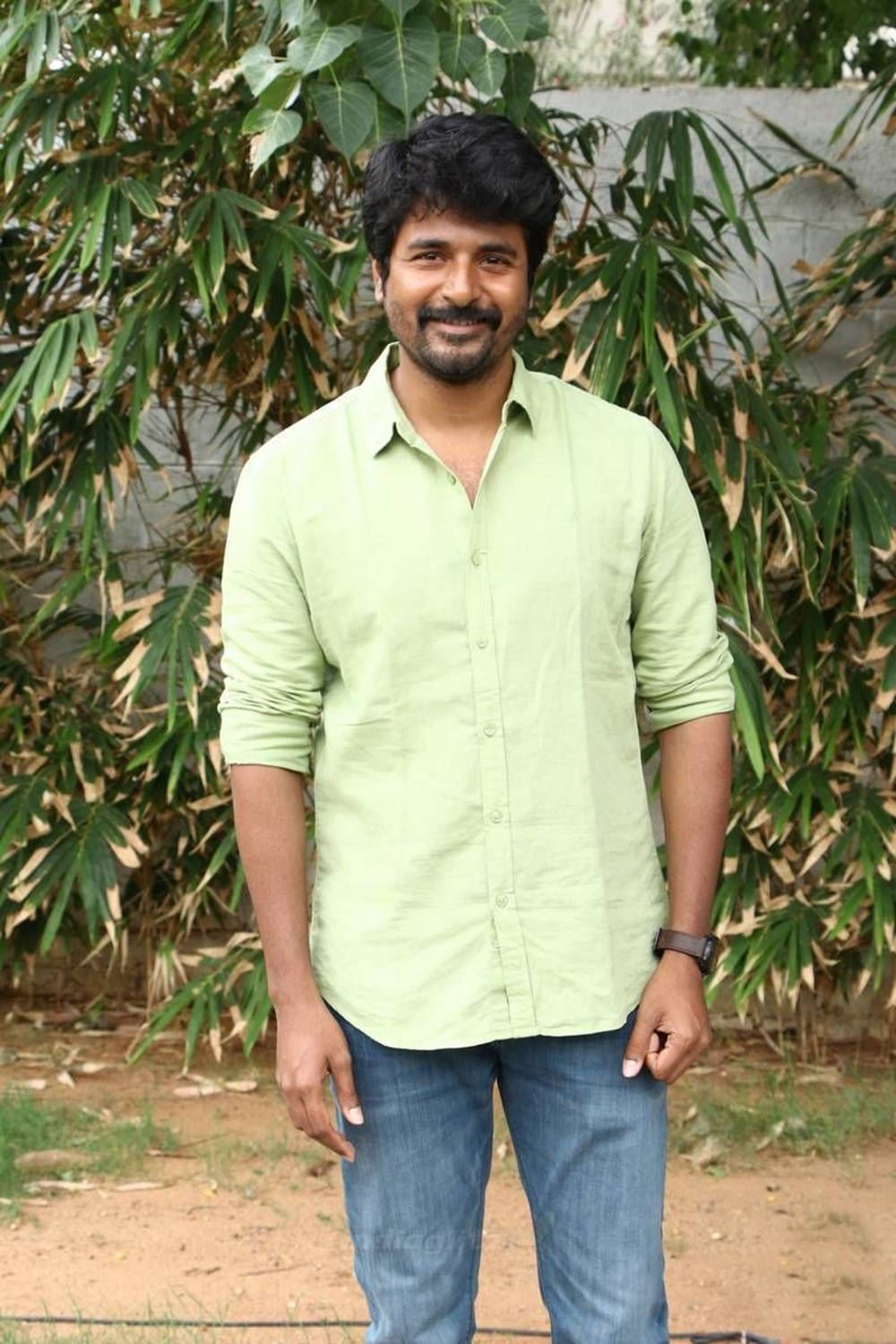 Sivakarthikeyan Light Green Shirt And Plants Wallpaper