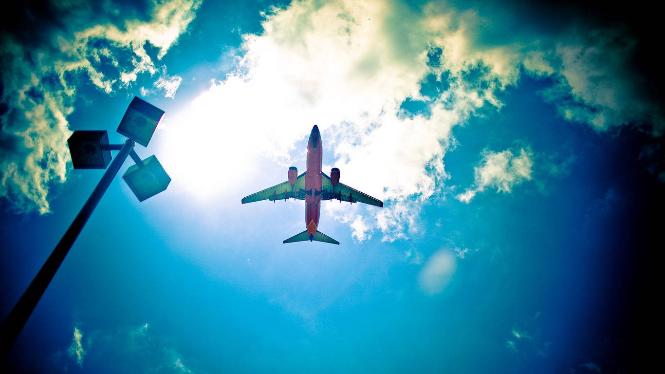 Small Plane On Blue Sky Wallpaper