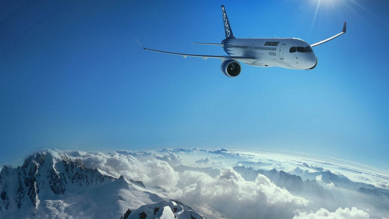 Small Plane Over Snow Wallpaper