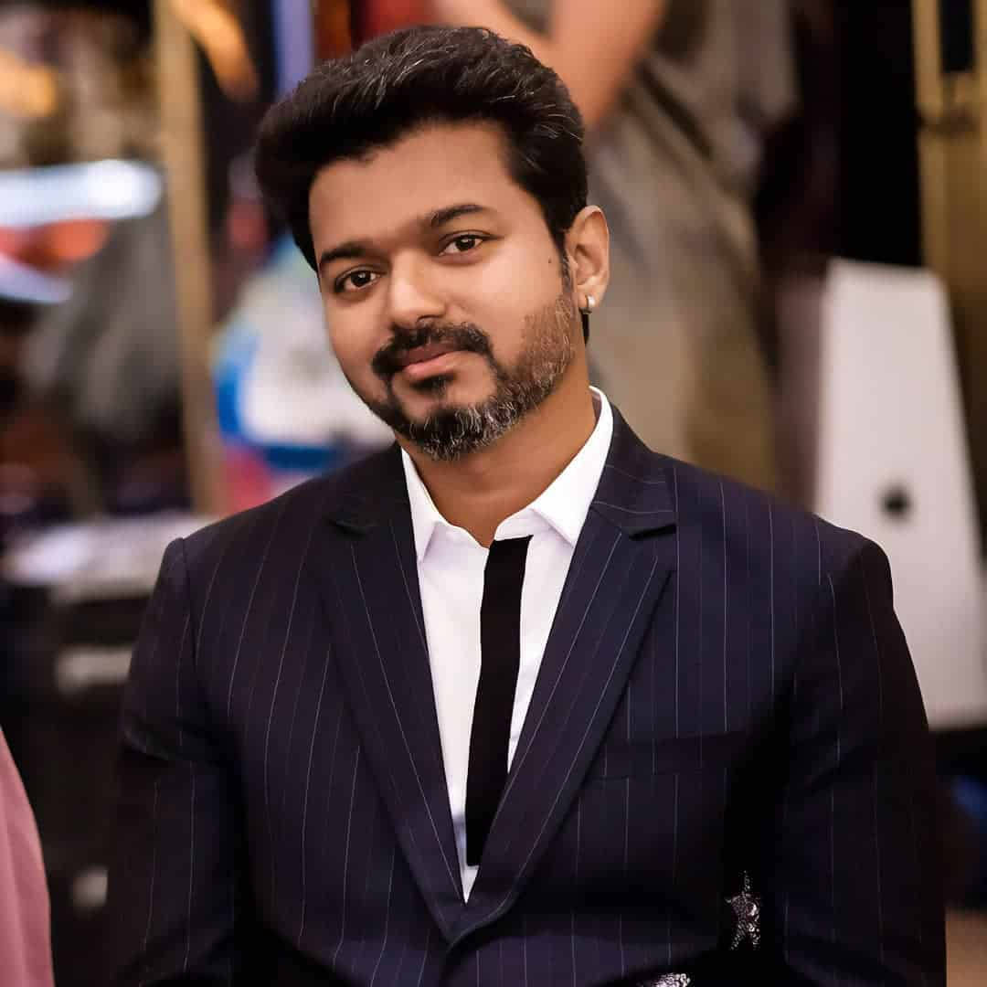 Smiling Thalapathy Hd Formal Attire Wallpaper