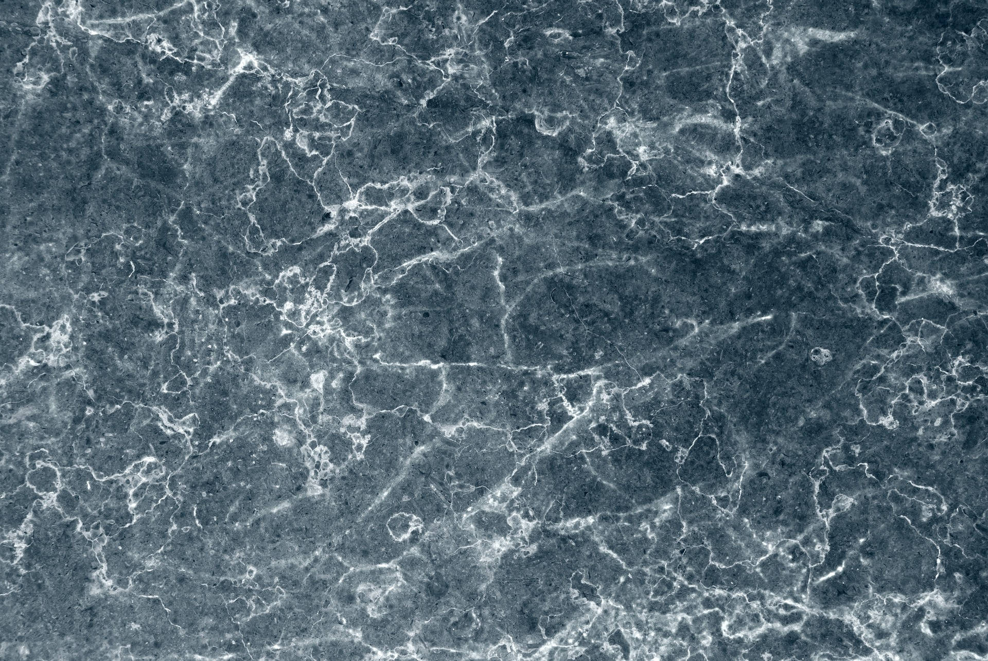 Sophisticated Aesthetics: White Cracks On Blue Marble Laptop Wallpaper