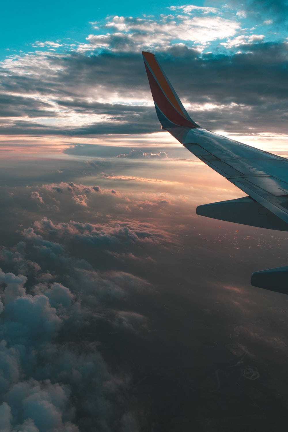 Southwest Airplane Above Dark Clouds Wallpaper