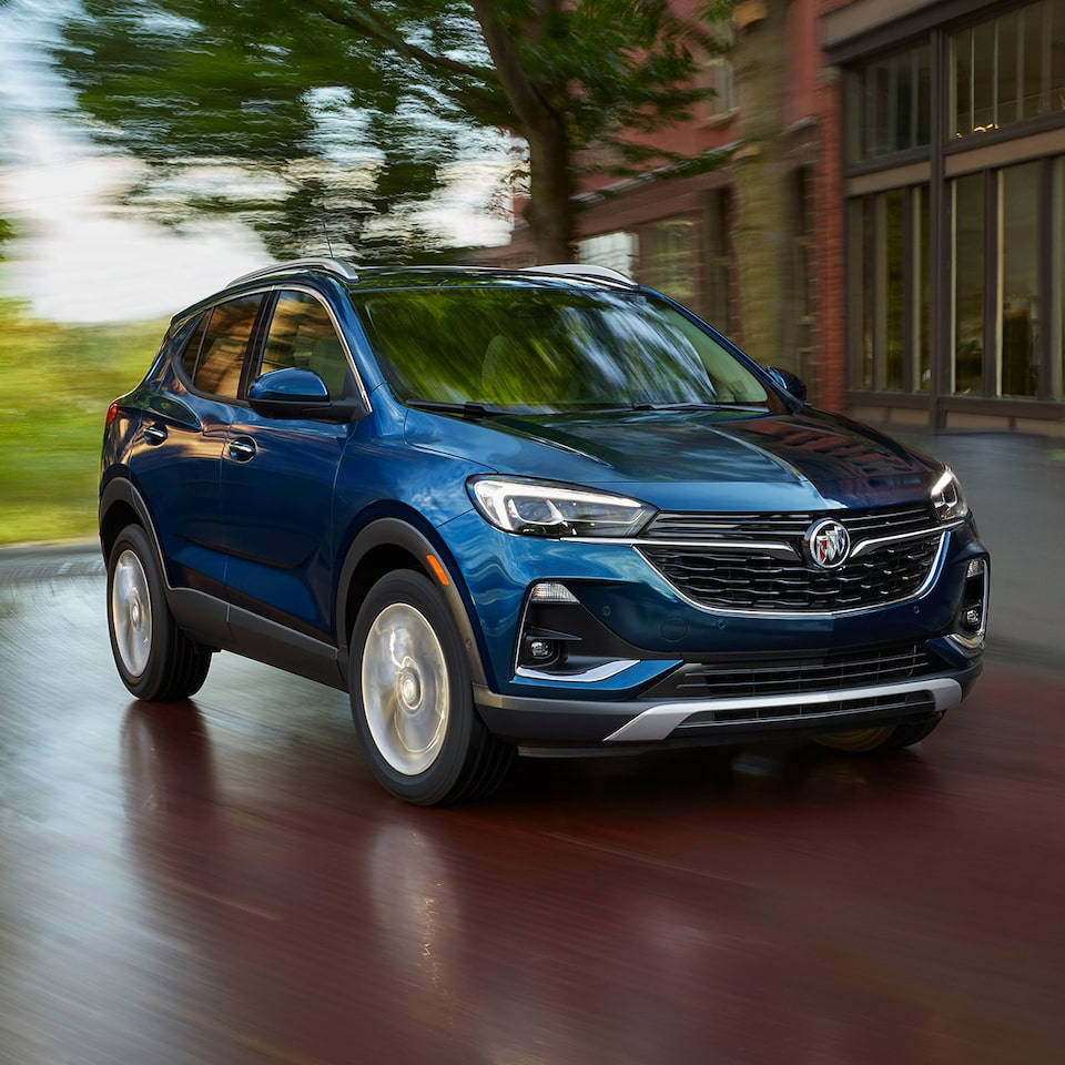 Speeding Cobalt Blue Buick Encore Wallpaper