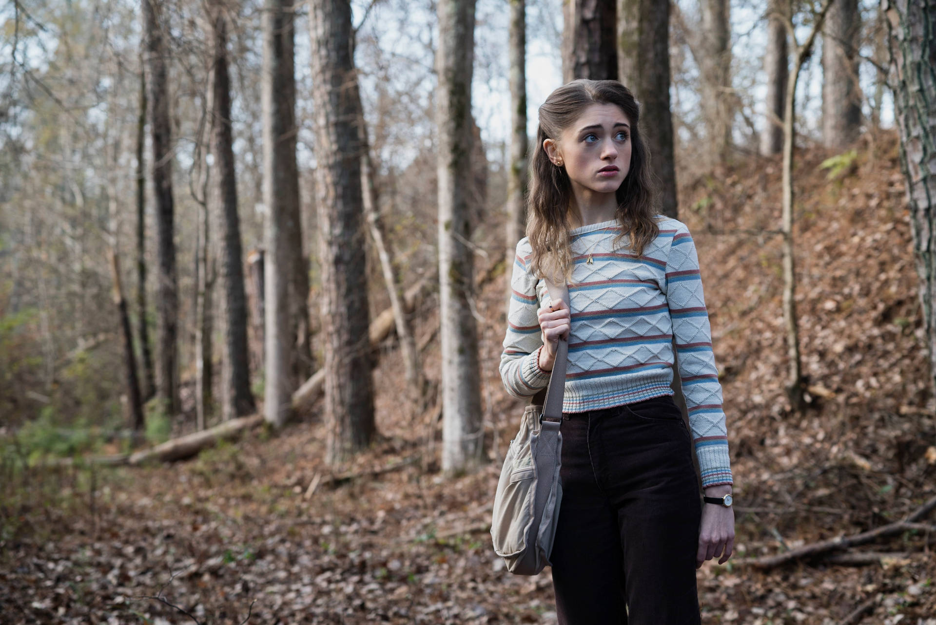 Stranger Things Cast Nancy In The Forest Wallpaper