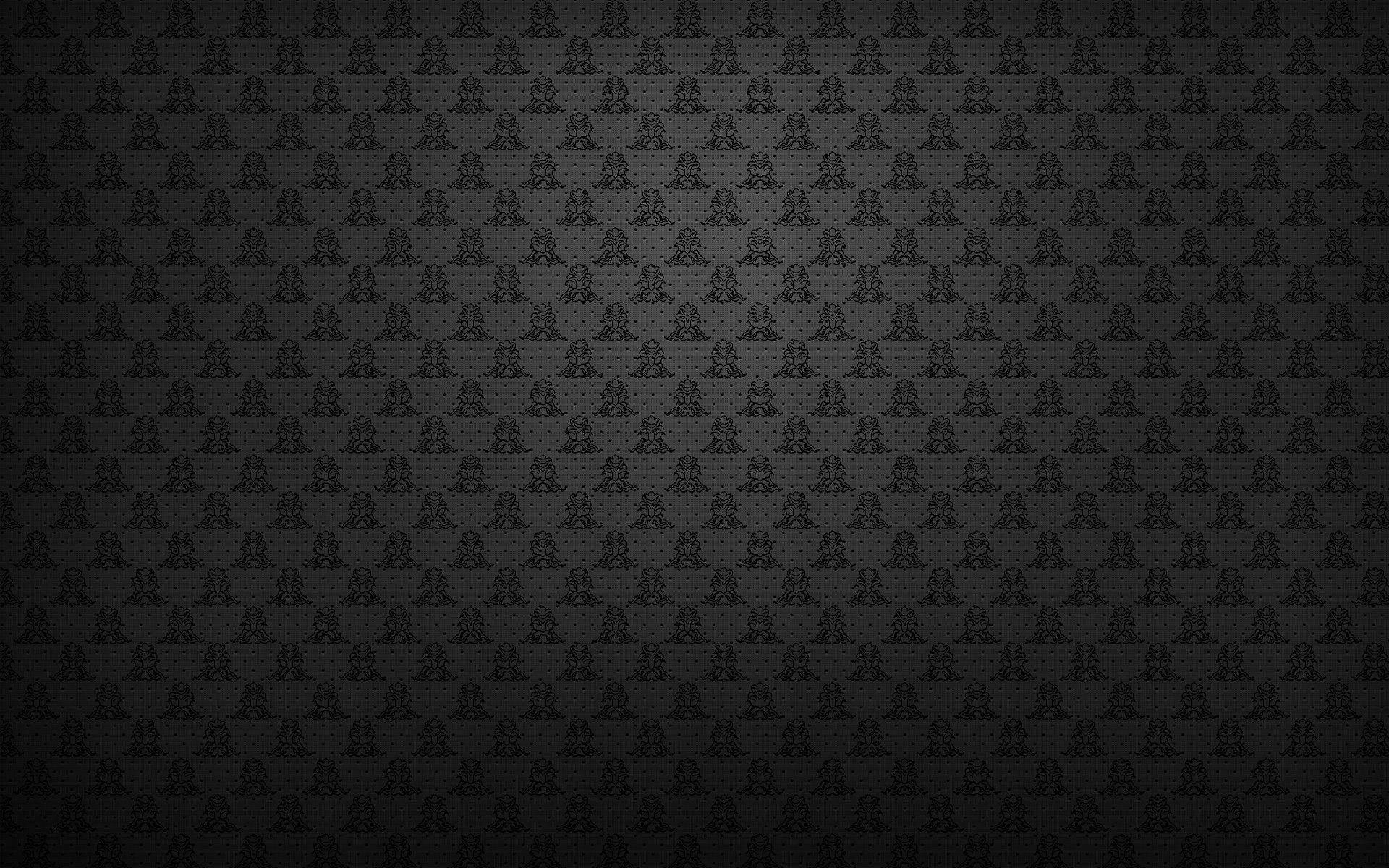 Stylish Black Head Like Pattern Wallpaper