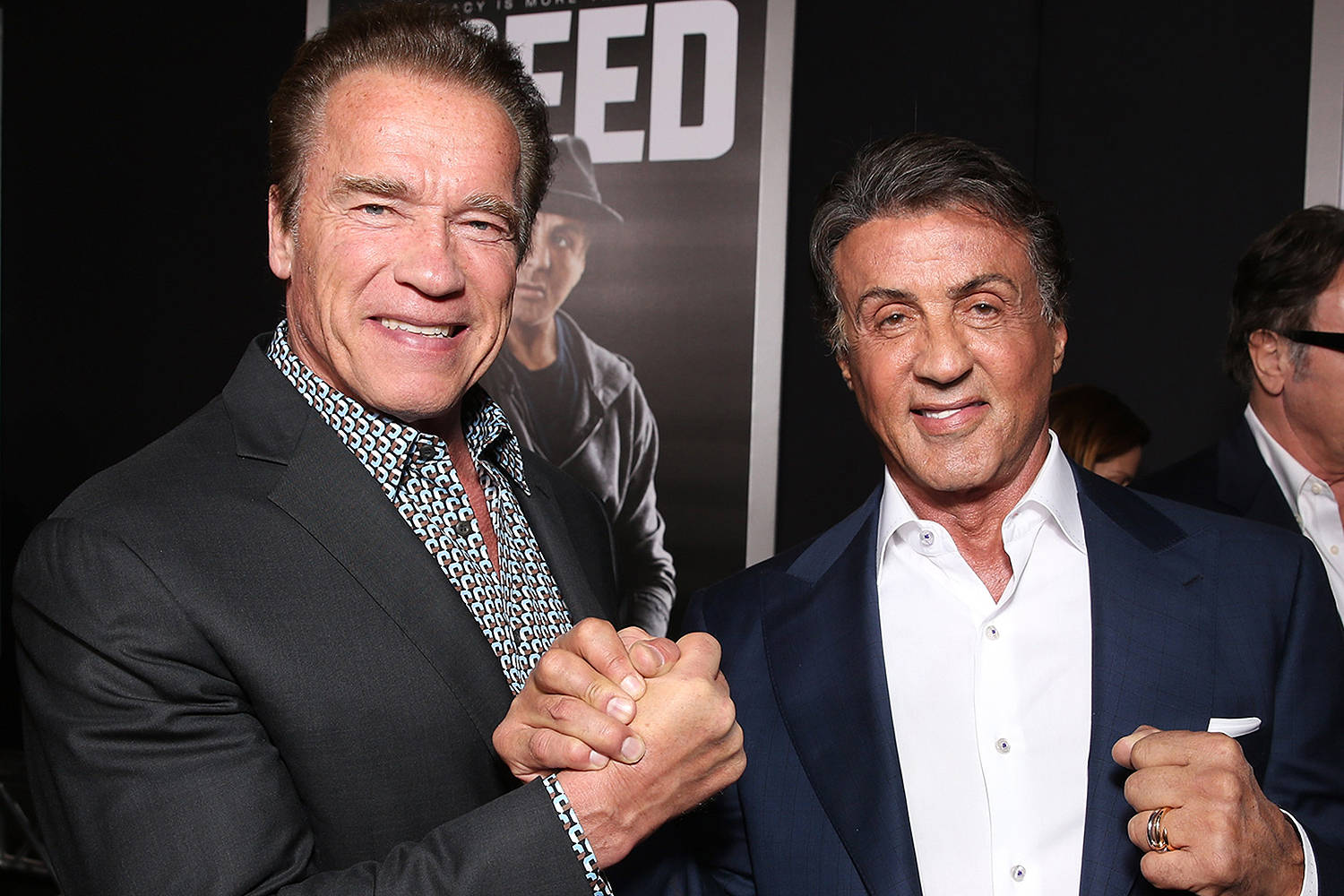 Sylvester Stallone Shaking Hands Arnold Wallpaper