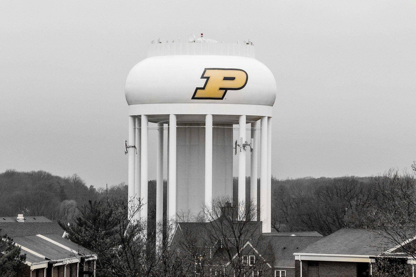 The Iconic Purdue University Water Tower At Dusk. Wallpaper