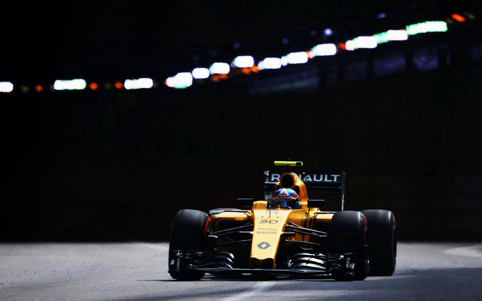 Thrilling Sprint On Track - Renault Formula 1 Racing Car Wallpaper