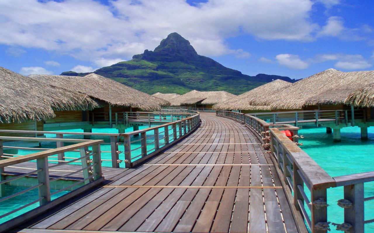 Tropical Resort Overwater Bungalows Mountain View.jpg Wallpaper