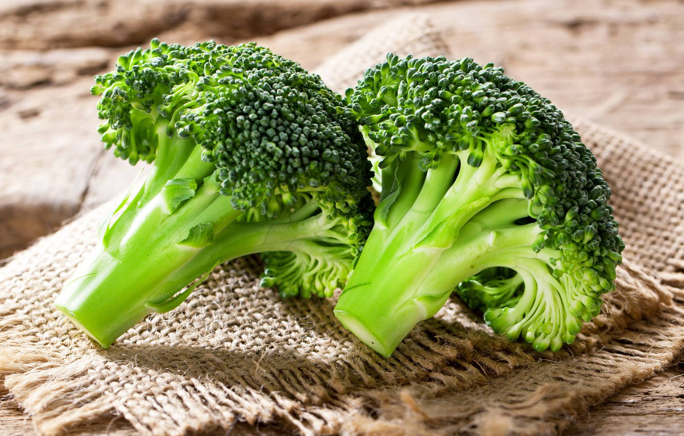 Two Dark Green Broccoli Heads Wallpaper