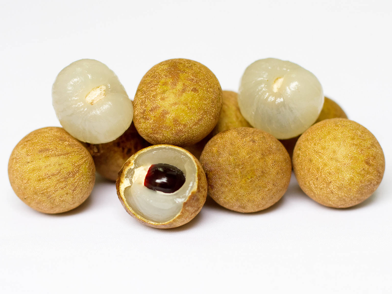 Two Peeled Longan Fruits Wallpaper