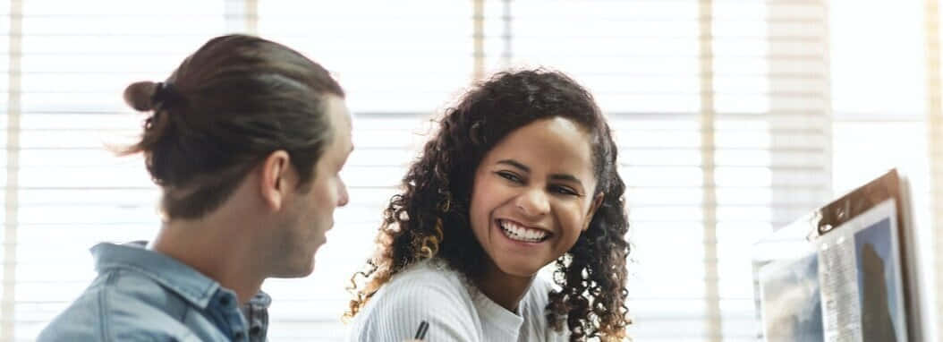 Two Young People Looking Wallpaper