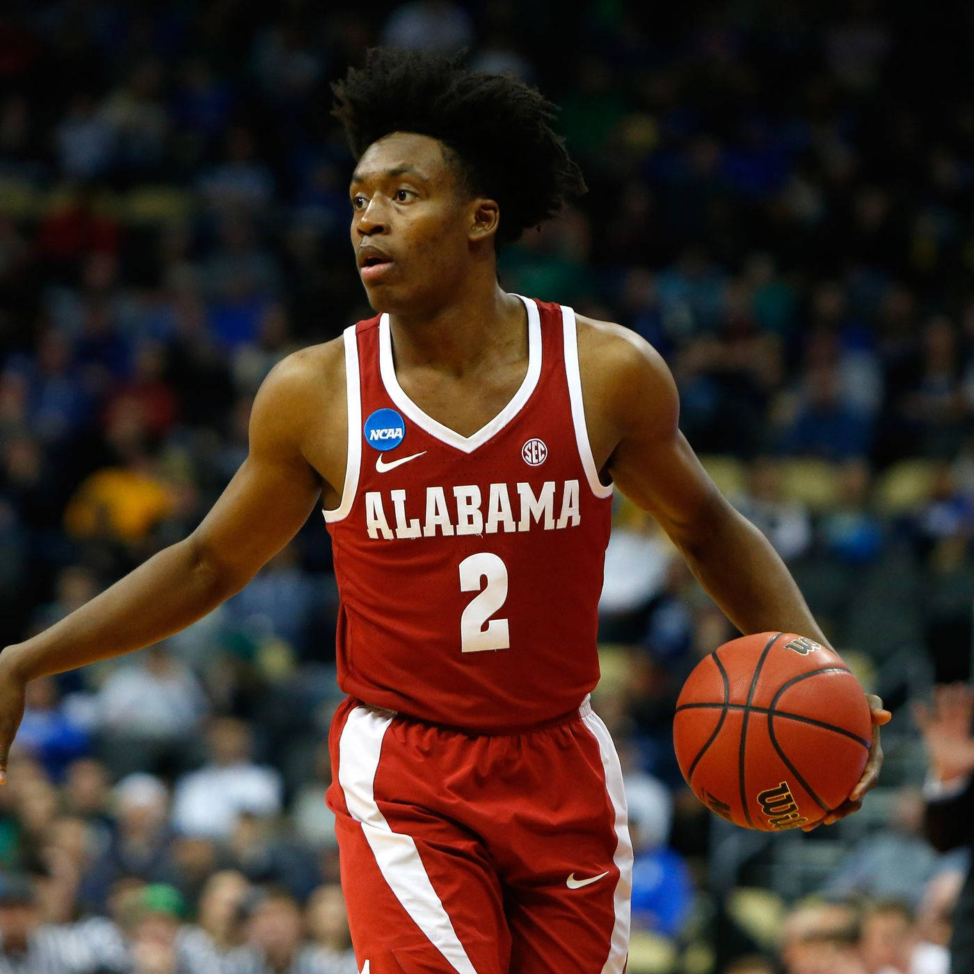 Utah Jazz Basketball Collin Sexton In Red Jersey Wallpaper