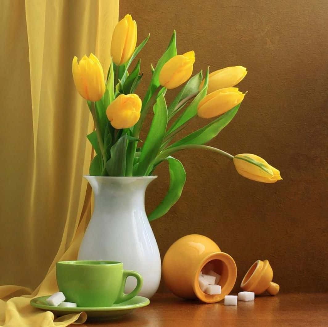 Vibrant Yellow Tulips In A Still Life Portrait Wallpaper