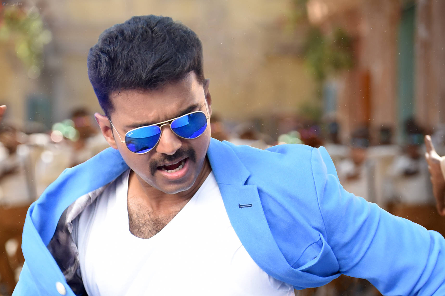 Vijay In Theri Movie Sporting Blue Sunglasses And Blazer Wallpaper