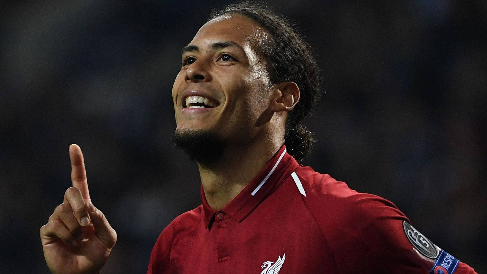 Virgil Van Dijk Smiling And Pointing Wallpaper