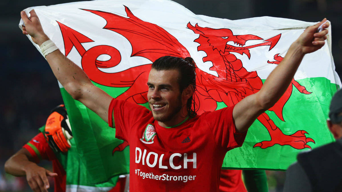 Wales National Football Team Gareth With Welsh Flag Wallpaper