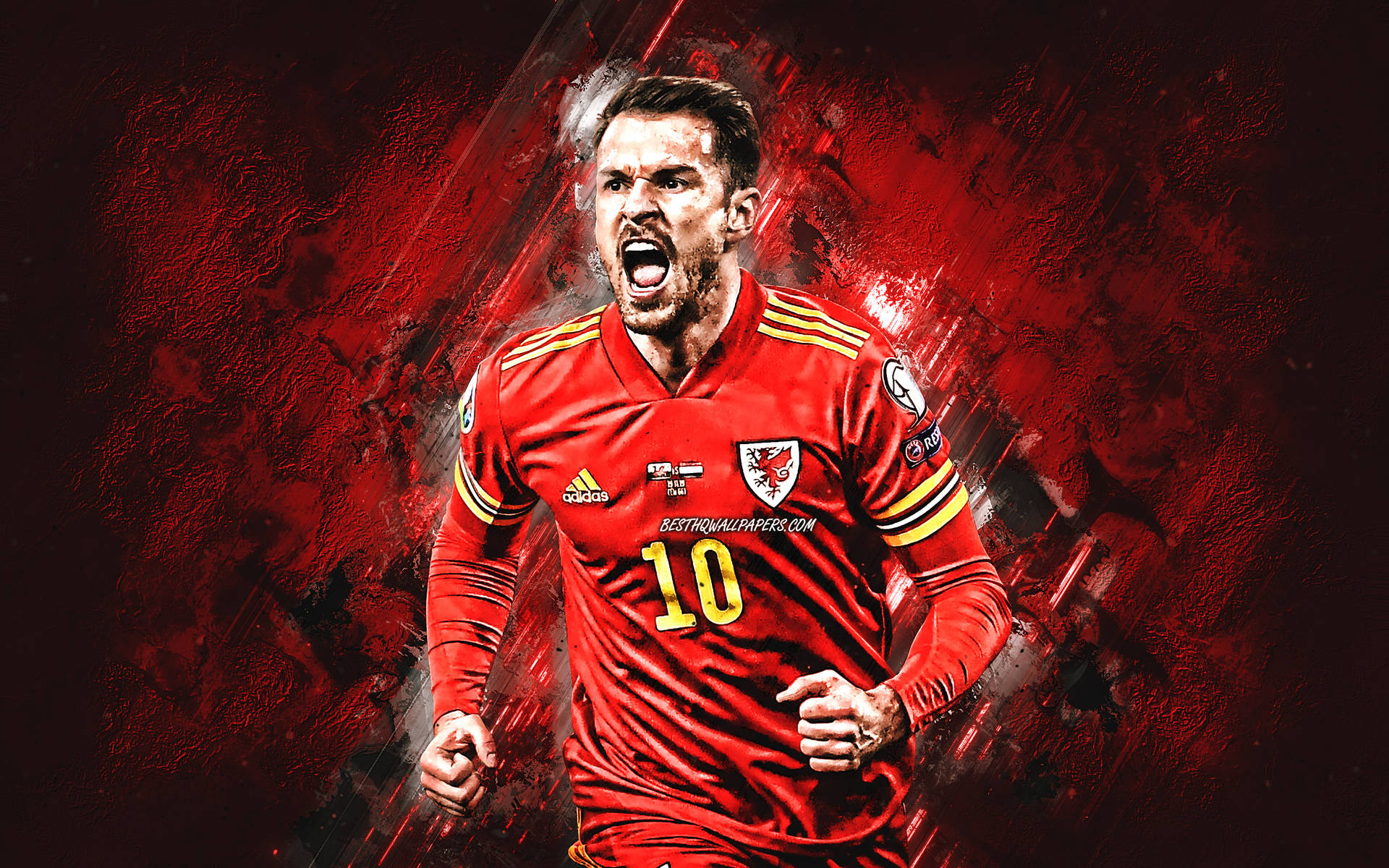 Wales National Football Team Star Player Aaron Ramsey In Action Wallpaper