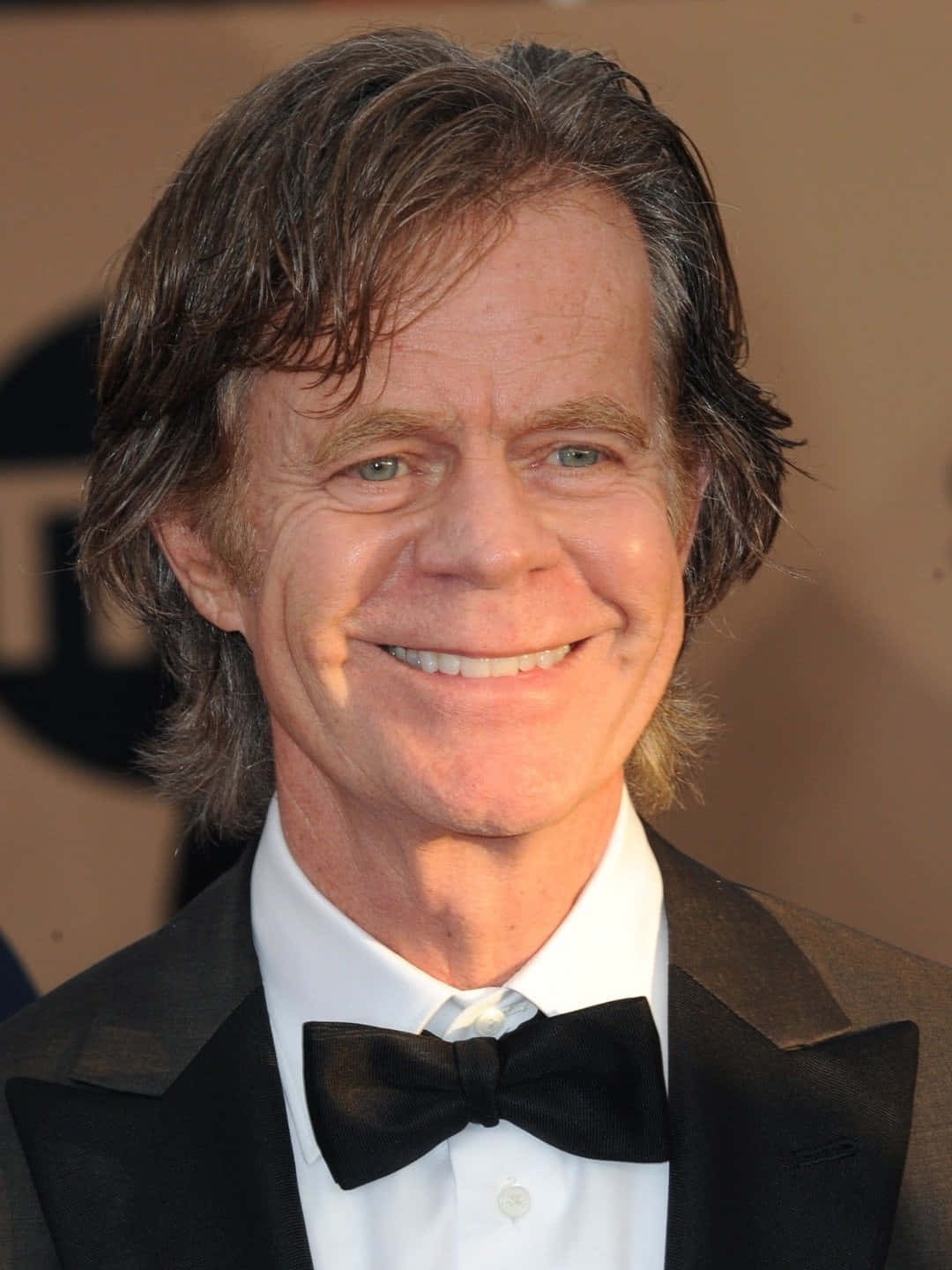 William H. Macy Posing In A Stylish Suit Wallpaper