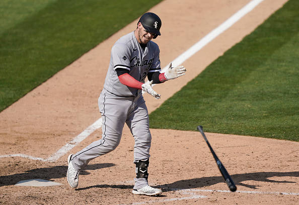 Yasmani Grandal Dropping His Bat Wallpaper