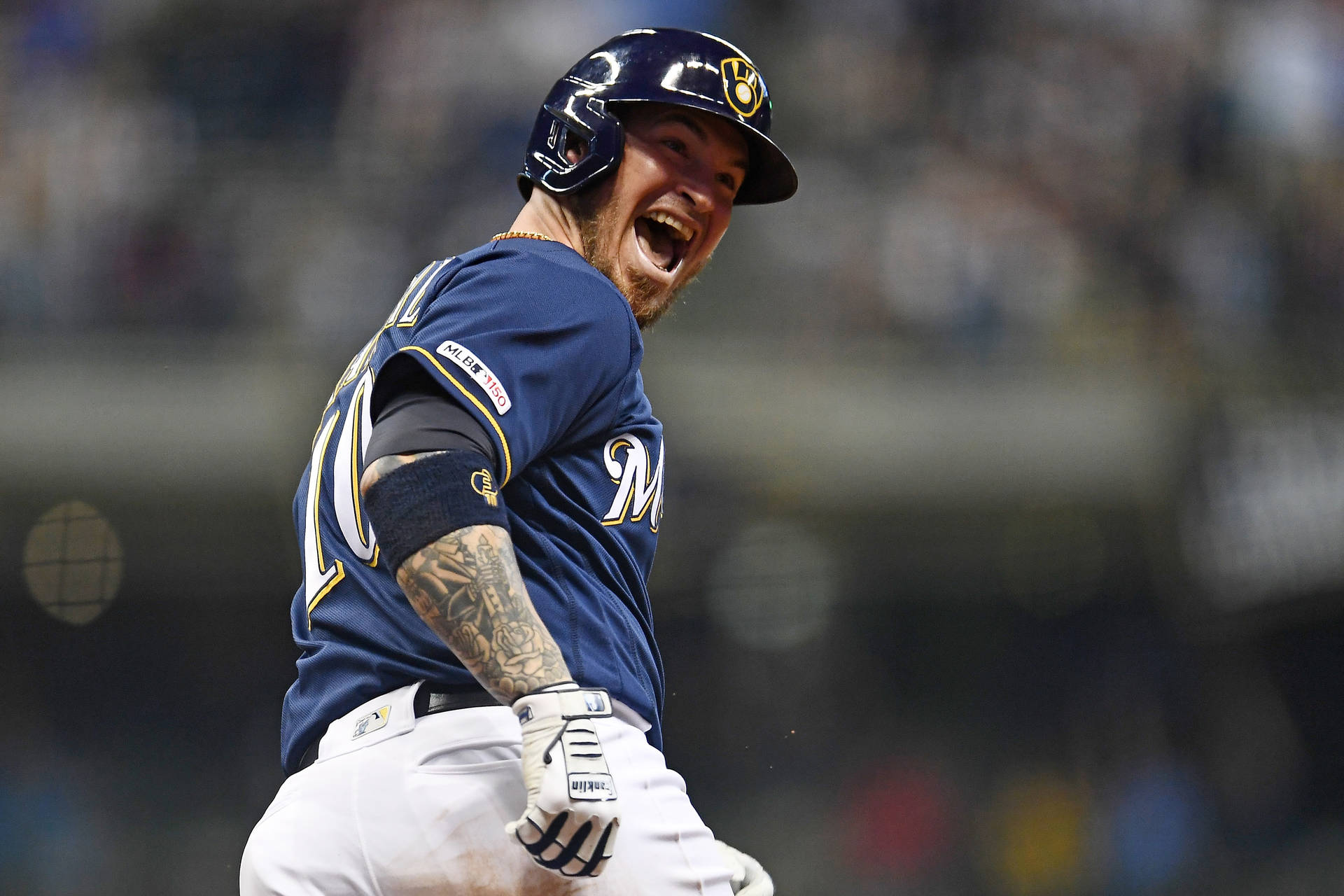 Yasmani Grandal Laughing While Wearing Helmet Wallpaper