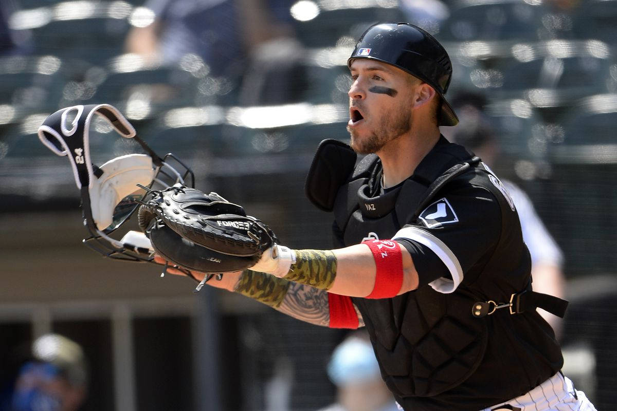 Yasmani Grandal Shouting With Face Paint Wallpaper