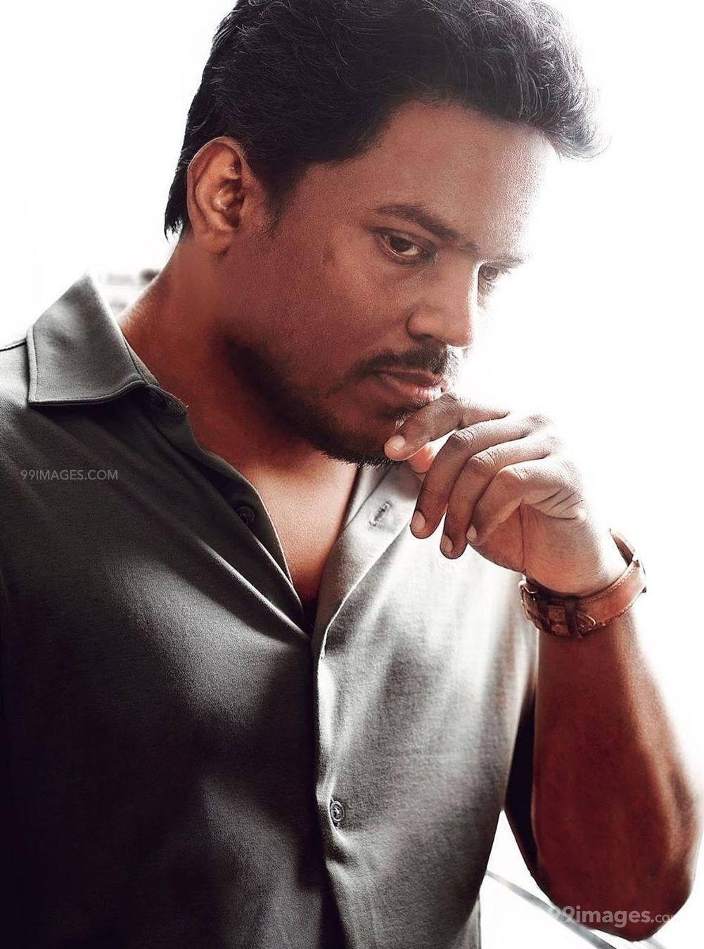 Yuvan Shankar Raja Against Bright Wallpaper