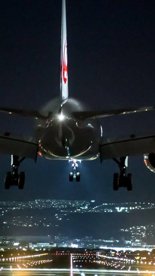 1080x1920 Airplane Landing At Night ✈ Wallpaper. Wallpaper Studio 10 Wallpaper