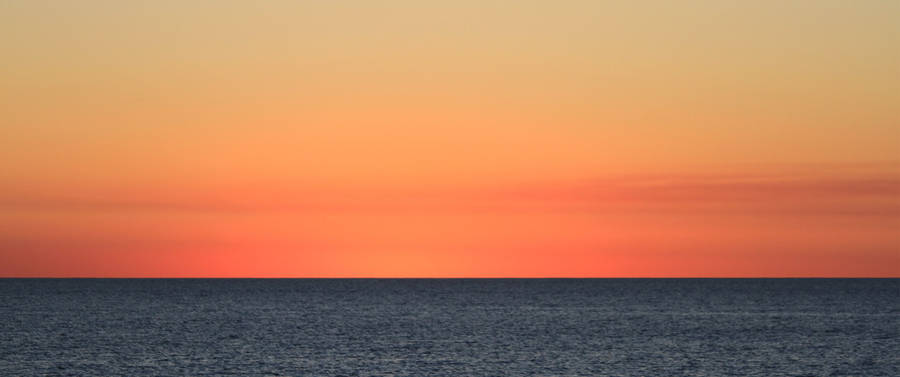 3440x1440 Minimalist Orange Sea Skies Wallpaper