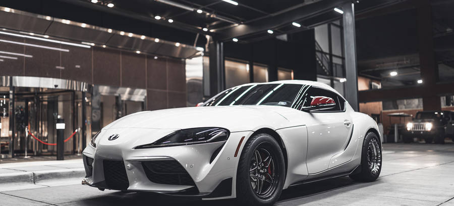 4k Toyota Supra White Display Wallpaper