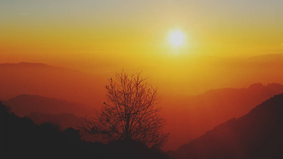 A Beautiful Sunrise In The Countryside Wallpaper