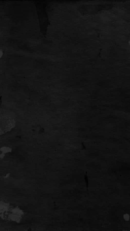 A Black And White Background With A Black And White Splatter Wallpaper
