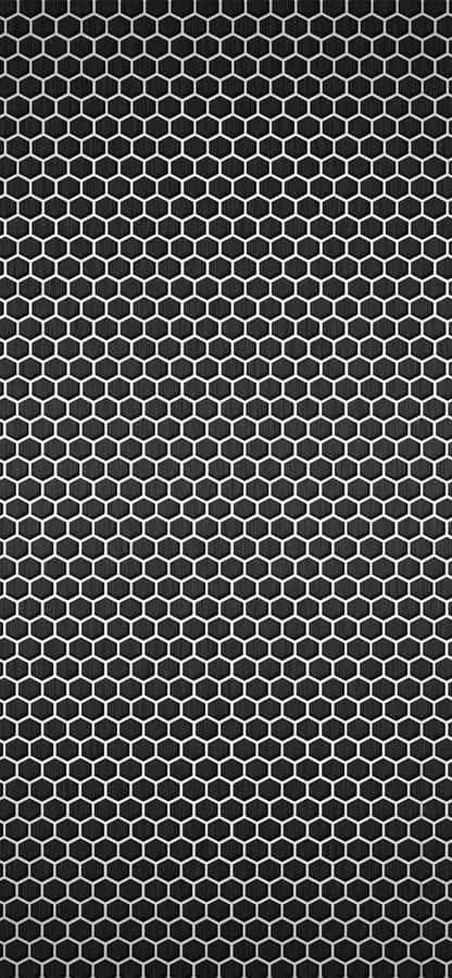A Black And White Hexagonal Pattern On A Black Background Wallpaper